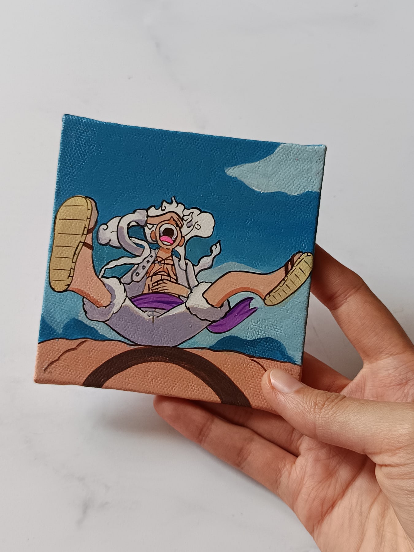Side view of Monkey D. Luffy — Gear 5 hand-painted mini canvas fridge magnet by Tulika Viegas