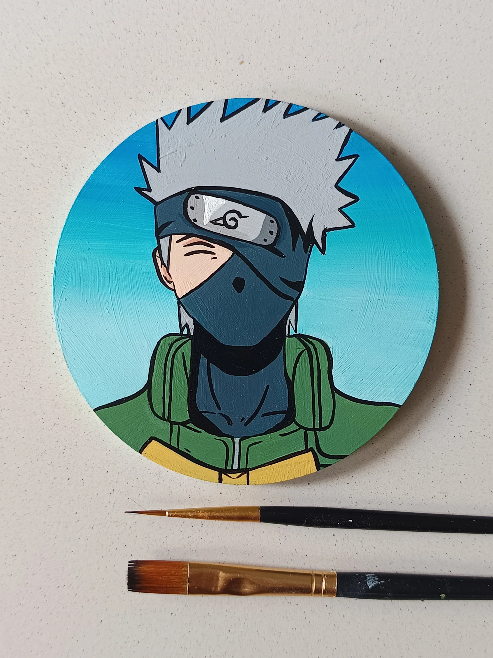 Side view of Kakashi Hatake hand-painted acrylic coasters by Tulika Viegas