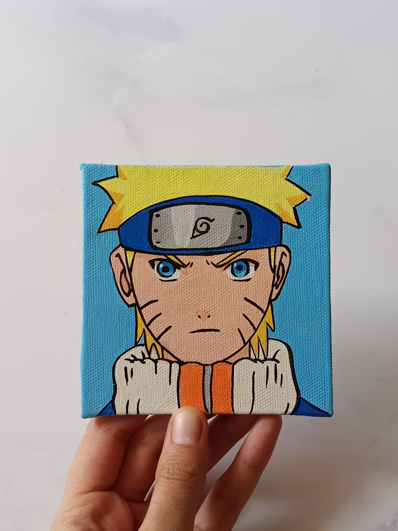 Side view of Naruto Uzumaki hand-painted mini canvas fridge magnet by Tulika Viegas
