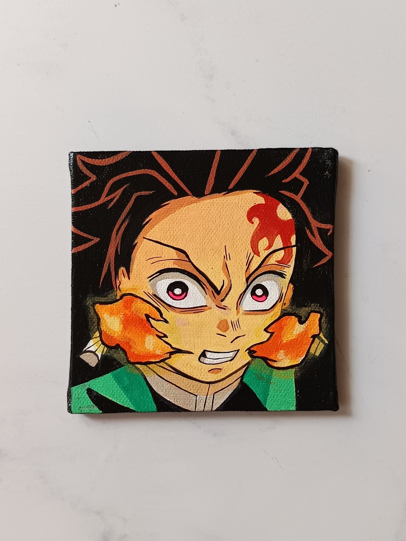 Close-up of Tanjiro Kamado anime acrylic painting by Tulika Viegas