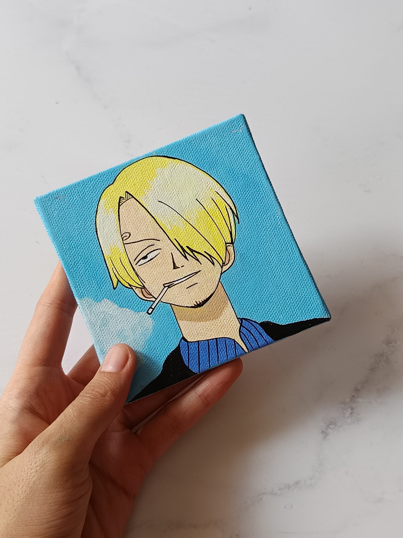 Side view of Sanji hand-painted mini canvas fridge magnet by Tulika Viegas