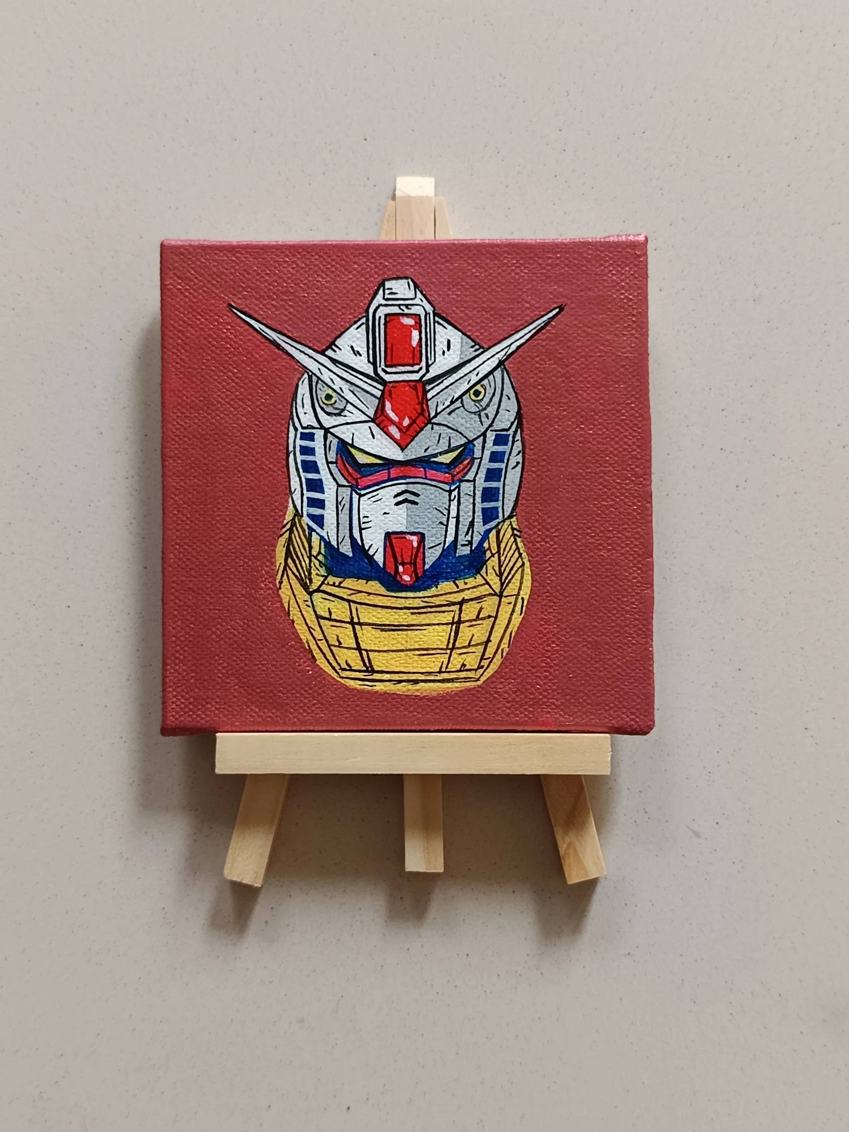 Side view of RX-78-2 hand-painted mini canvas fridge magnet by Tulika Viegas