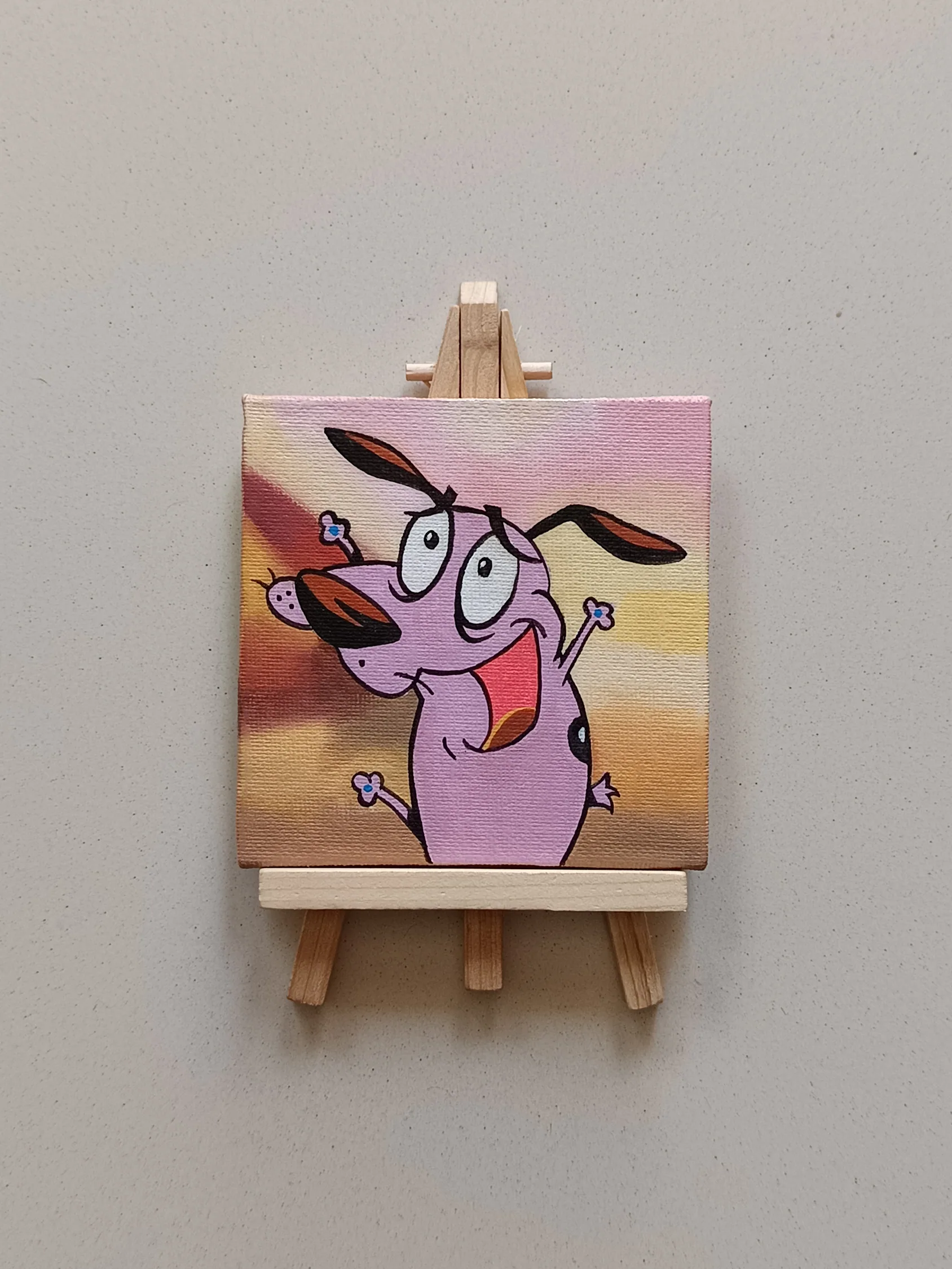 Side view of Courage the Cowardly Dog hand-painted mini canvas fridge magnet by Tulika Viegas