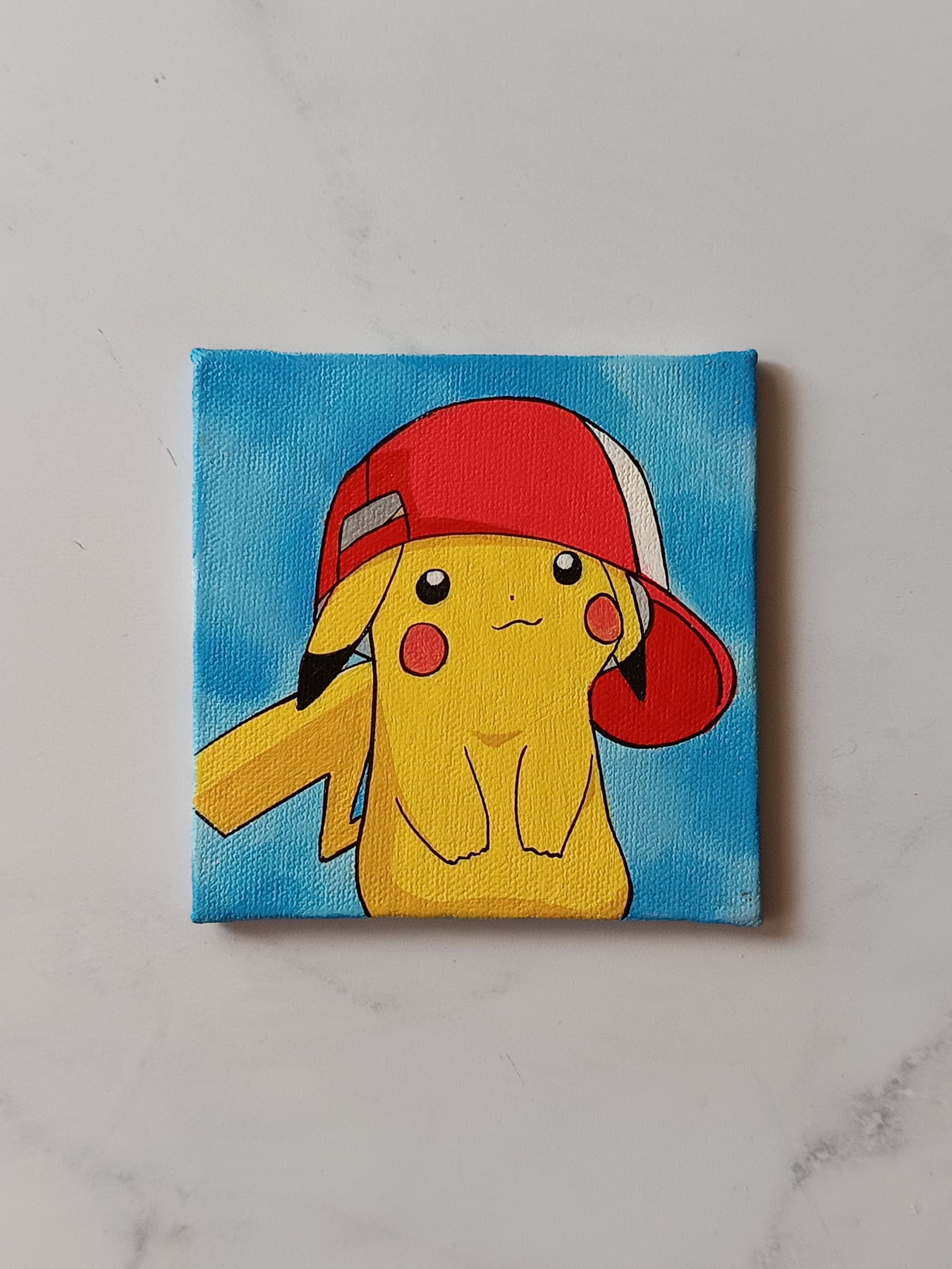 Close-up of Pikachu with Cap anime acrylic painting by Tulika Viegas