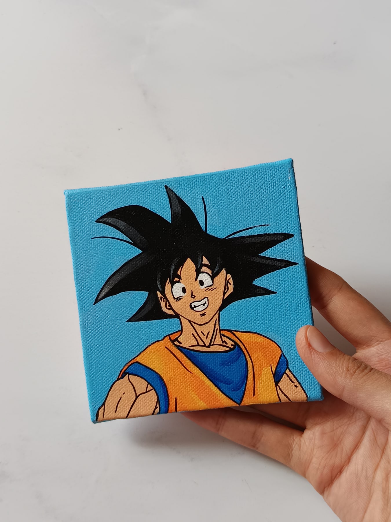 Close-up of Son Goku anime acrylic painting by Tulika Viegas