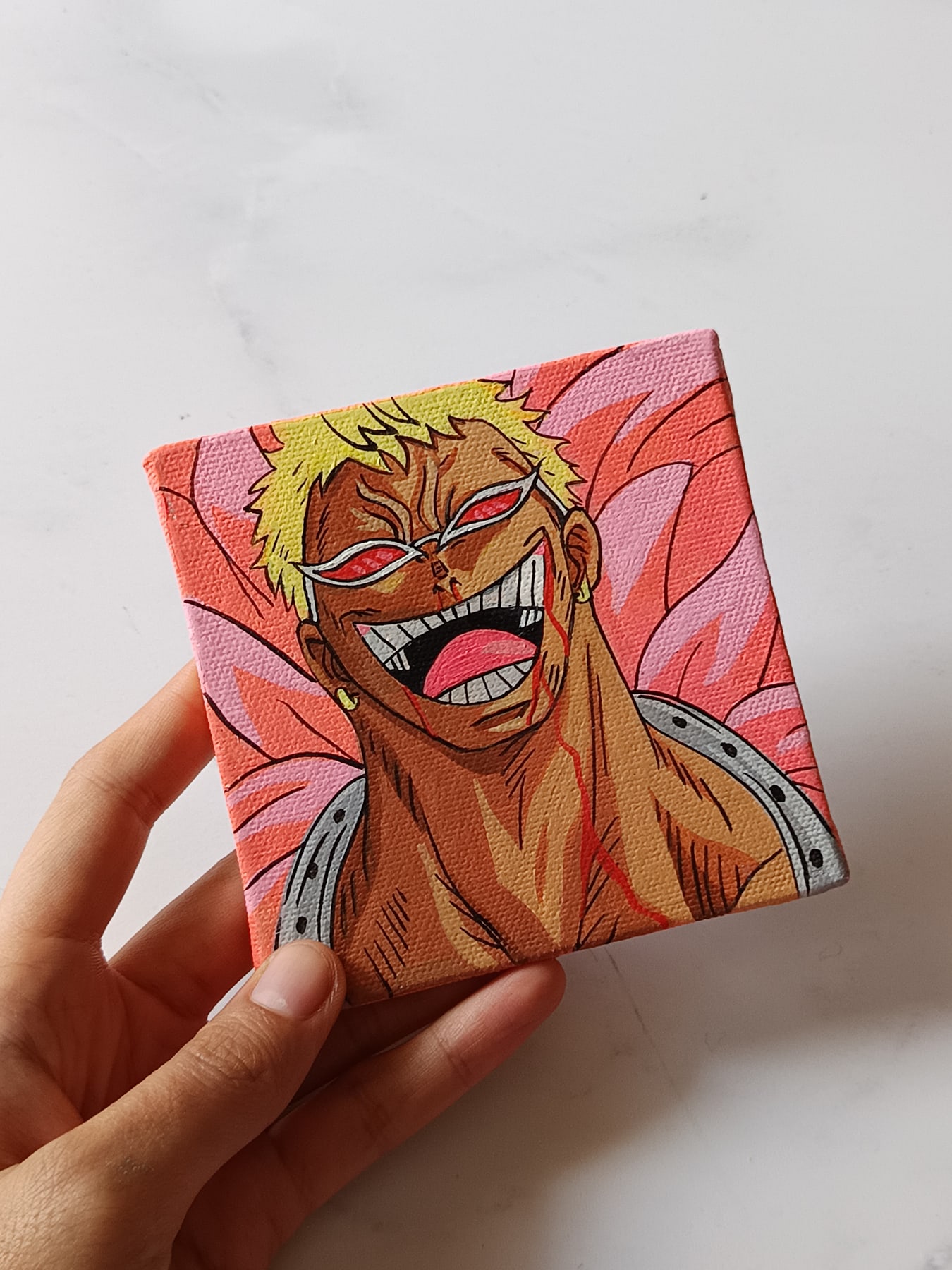 Side view of Donquixote Doflamingo hand-painted mini canvas fridge magnet by Tulika Viegas
