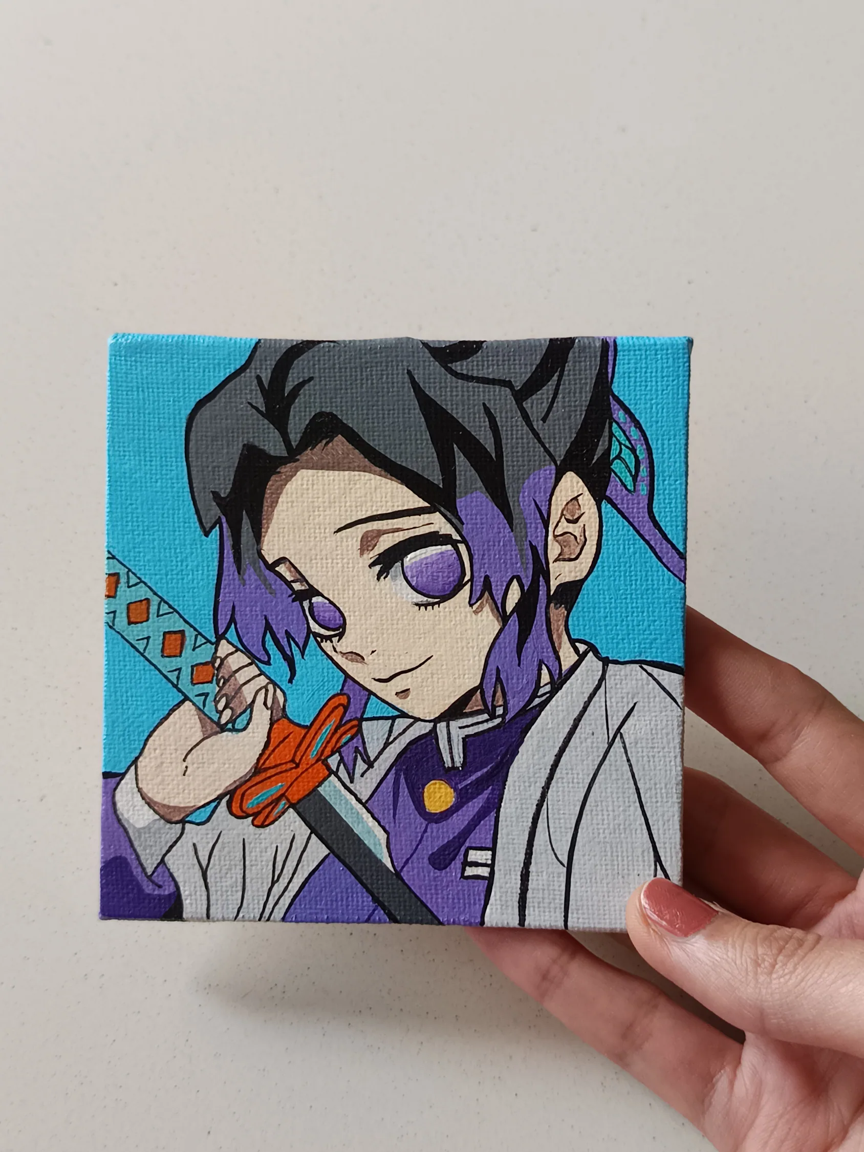 Side view of Shinobu Kocho hand-painted mini canvas fridge magnet by Tulika Viegas