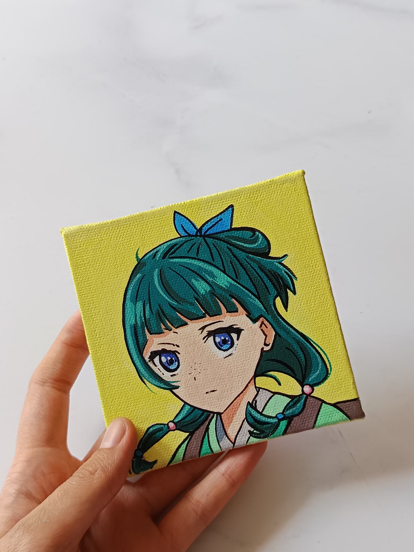 Close-up of Maomao anime acrylic painting by Tulika Viegas