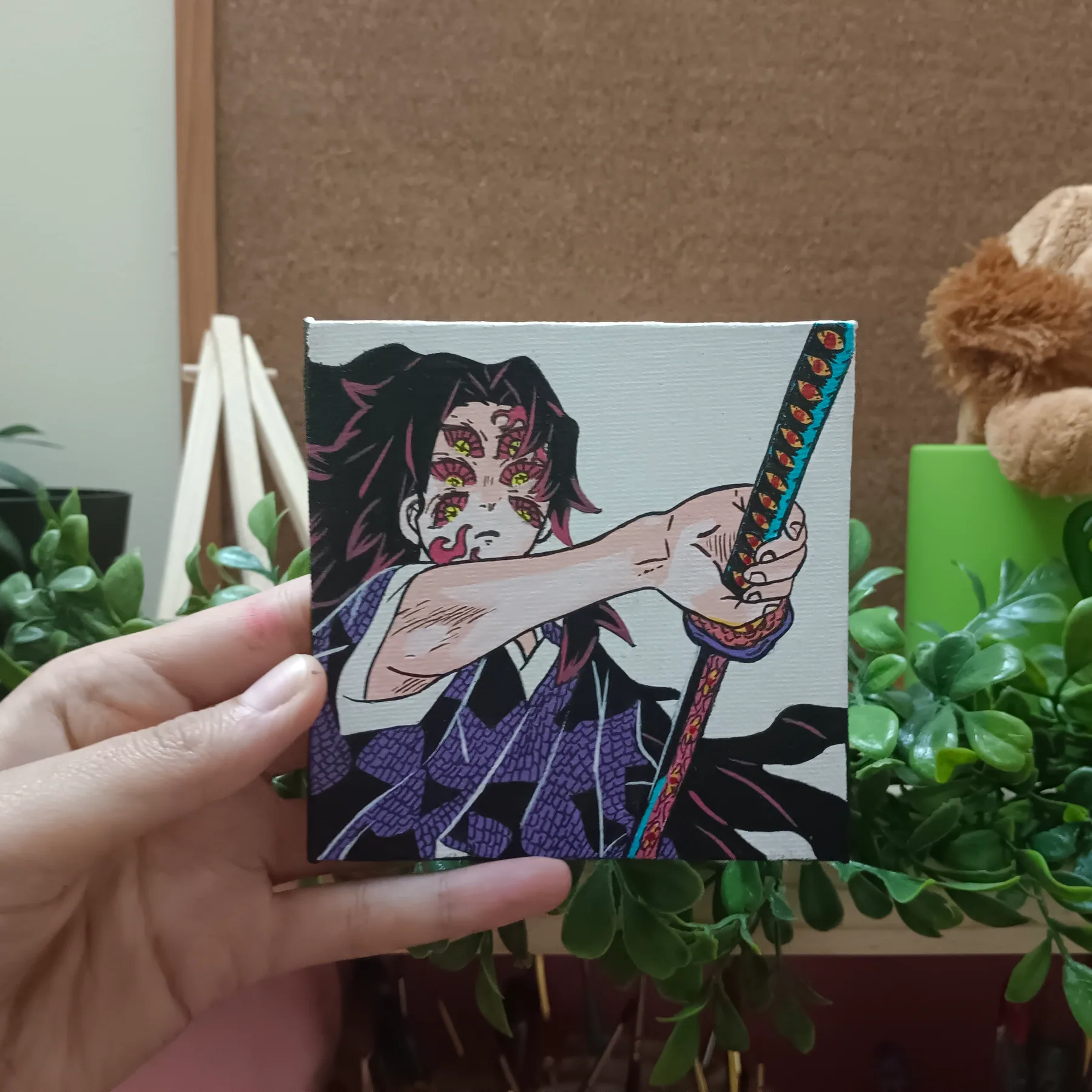 Handheld acrylic mini-canvas portrait of an anime swordsman with a katana and purple background details.