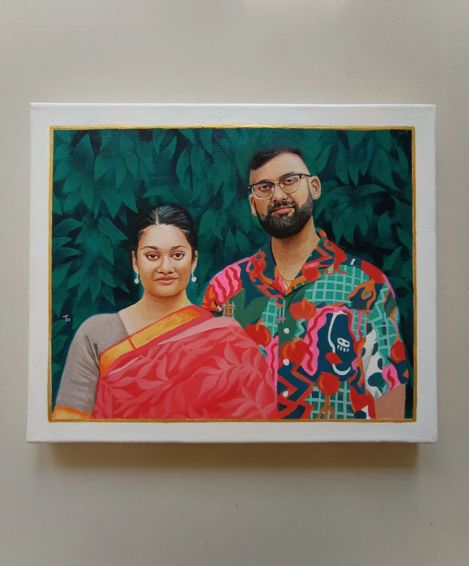 Custom couple canvas portrait from a photo with rich teal leaves and bright clothing, painted as a personal gift.
