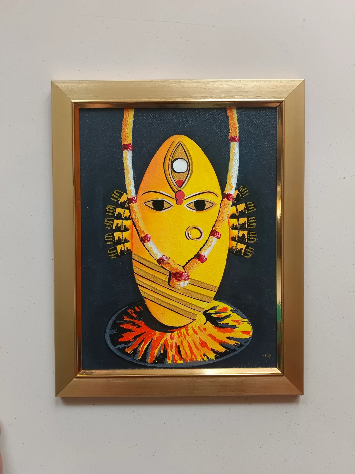Yellow Bhairavi Devi inspired religious painting in a gold frame, created with warm colours and devotional detail.