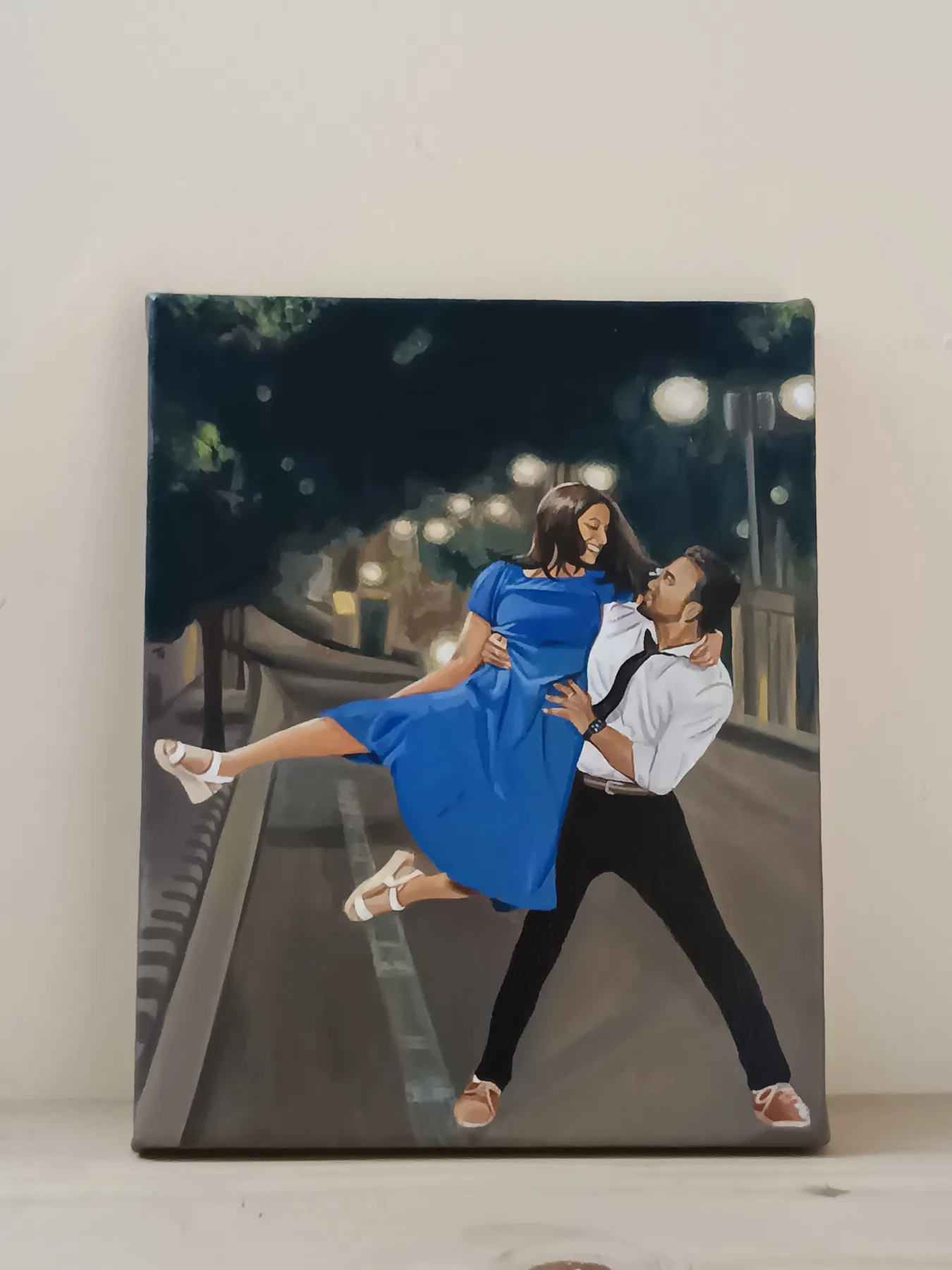 Playful romantic painting of a couple dancing together at night, made as a lively custom couple artwork.