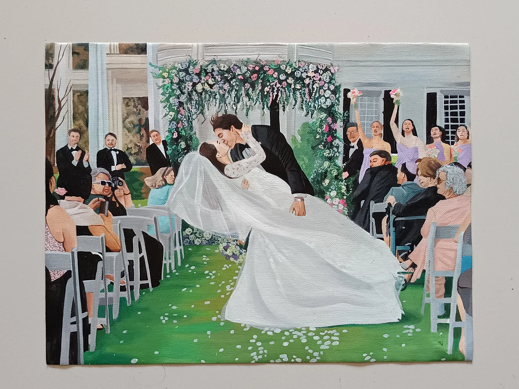 Wedding couple canvas painting with guests and floral decor, created as a personalised romantic commission piece.